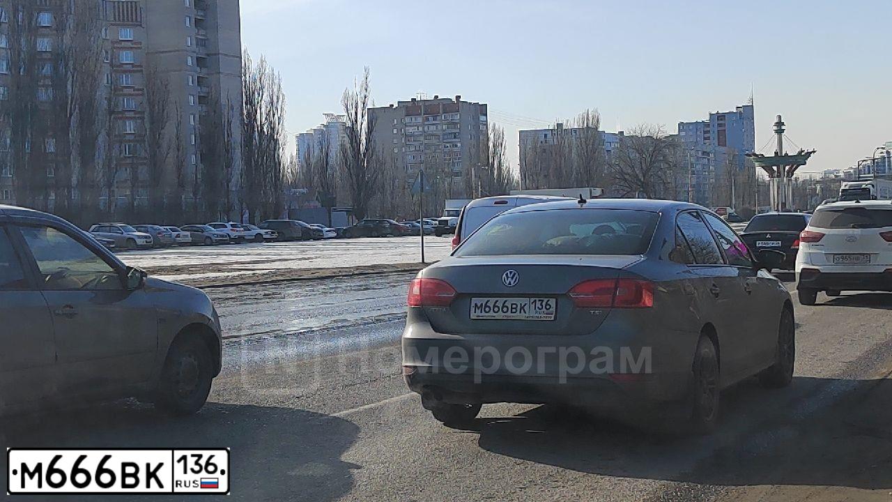 Фото автомобиля VOLKSWAGEN JETTA, 2011 — госномер М666ВК136. Цвет: ТЕМНО-СЕРЫЙ