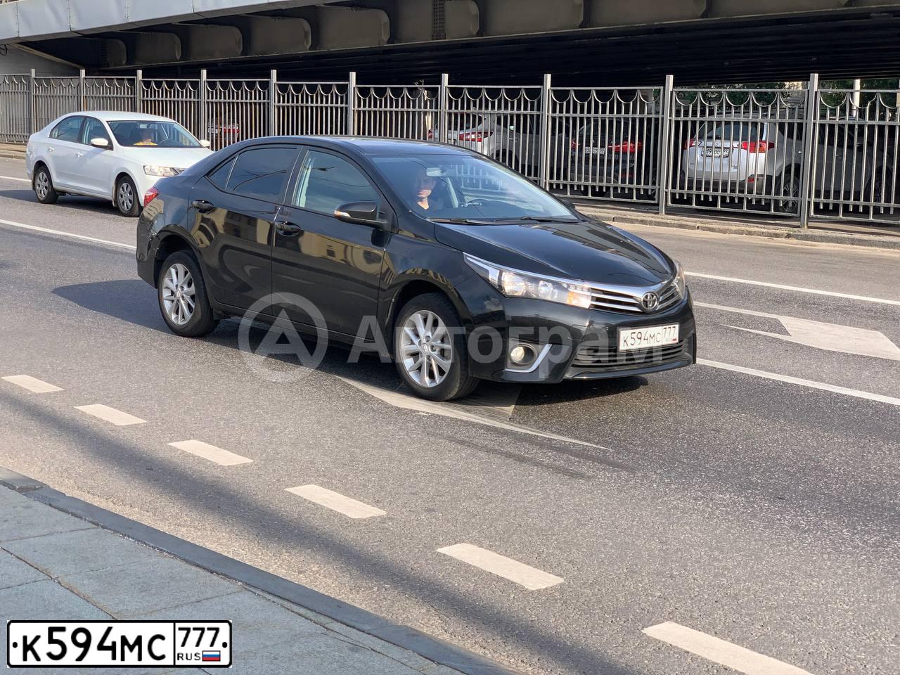 Фото автомобиля TOYOTA COROLLA, 2014 — госномер К594МС777. Цвет: ЧЕРНЫЙ