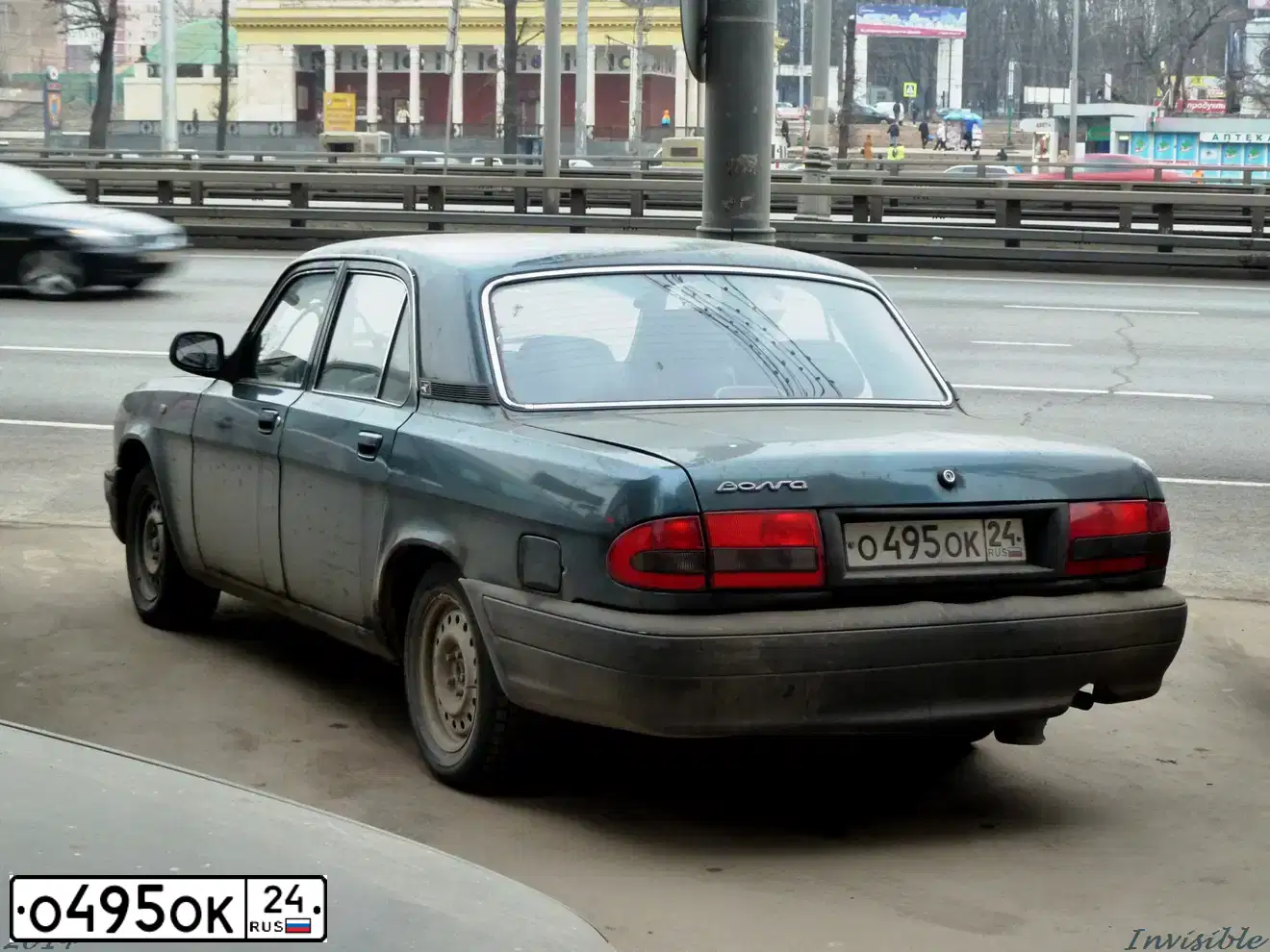 Фото автомобиля GAZ 3110 WOLGA, 2004 — госномер Е321НР790. Цвет: ЗЕЛЕНЫЙ