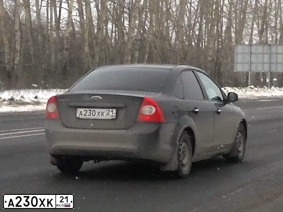 Фото автомобиля FORD FOCUS, 2011 — госномер А230ОХ21. Цвет: ЧЕРНЫЙ