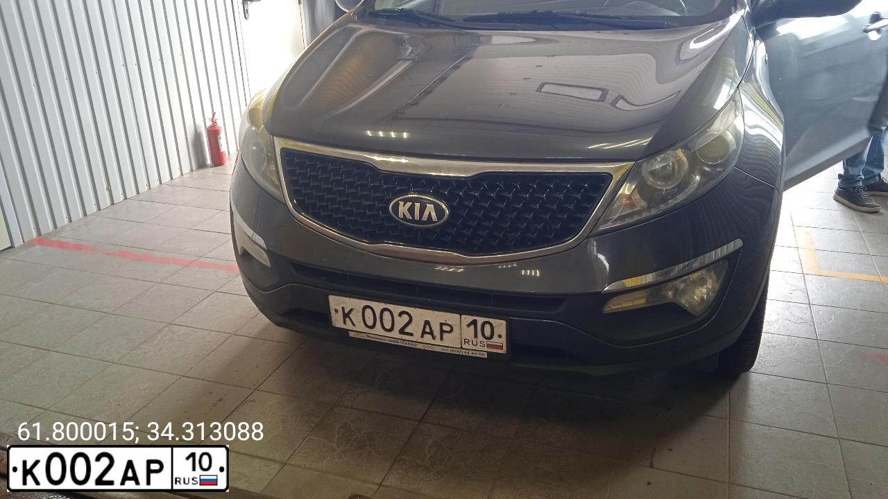 Фото автомобиля KIA SPORTAGE, 2014 — госномер К002АР10. Цвет: СЕРЫЙ