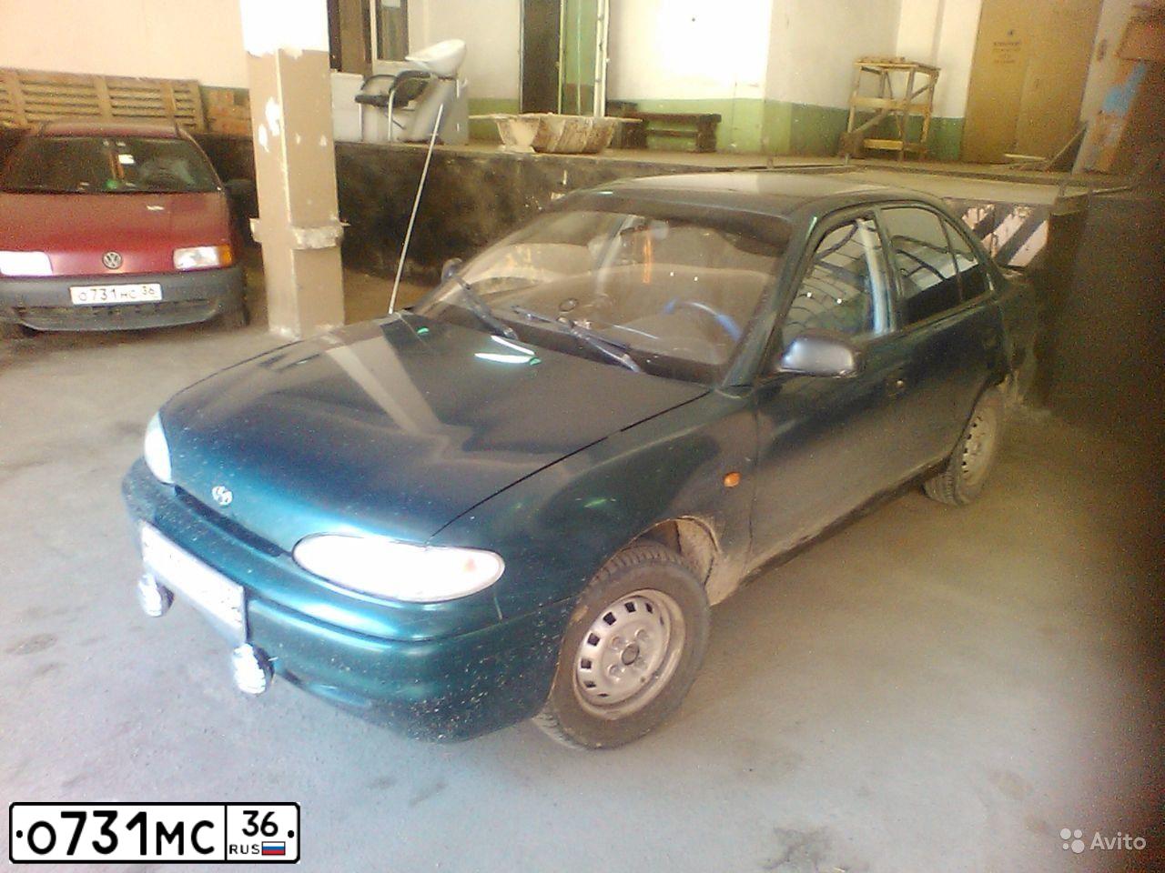 Фото автомобиля LADA 2115 SAMARA, 2006 — госномер О731МС36. Цвет: средний серо-зеленый металлик