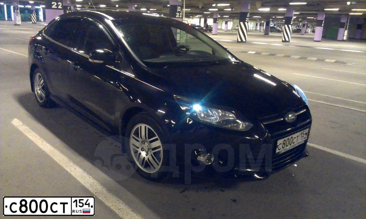 Фото автомобиля FORD FOCUS, 2013 — госномер Т419ЕА154. Цвет: ЧЕРНЫЙ