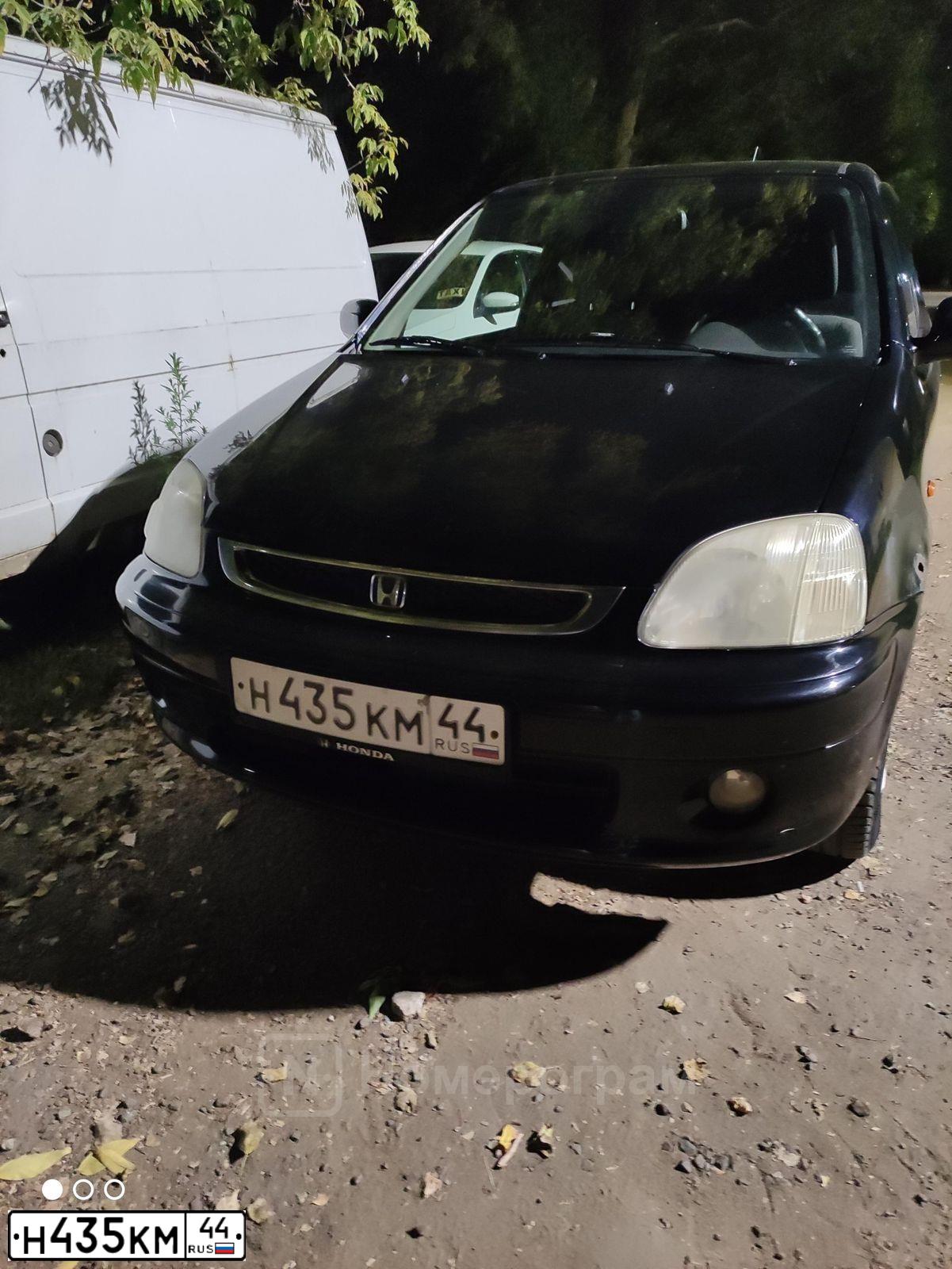 Фото автомобиля HONDA LOGO, 1999 — госномер Н435КМ44. Цвет: ЧЕРНЫЙ