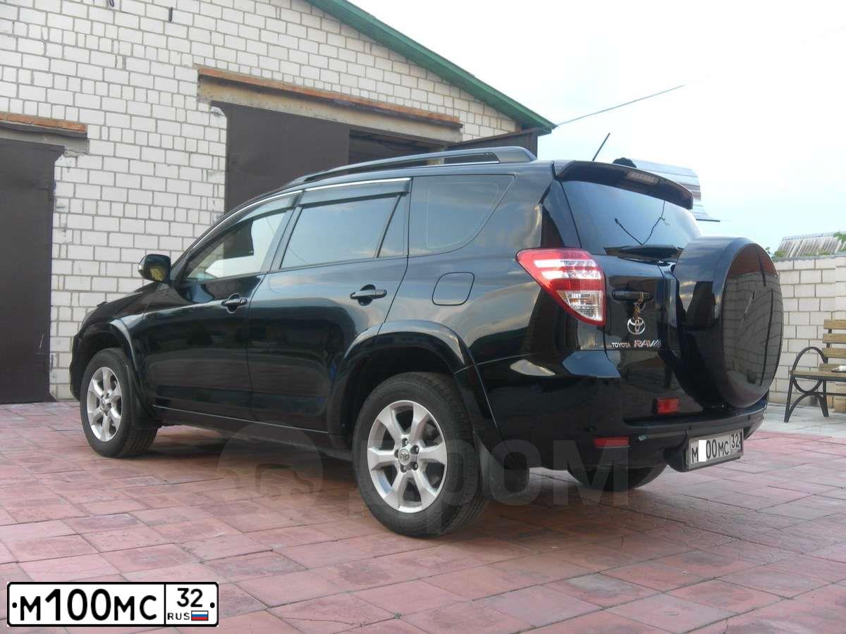 Фото автомобиля TOYOTA RAV4, 2012 — госномер М100МС32. Цвет: ЧЕРНЫЙ