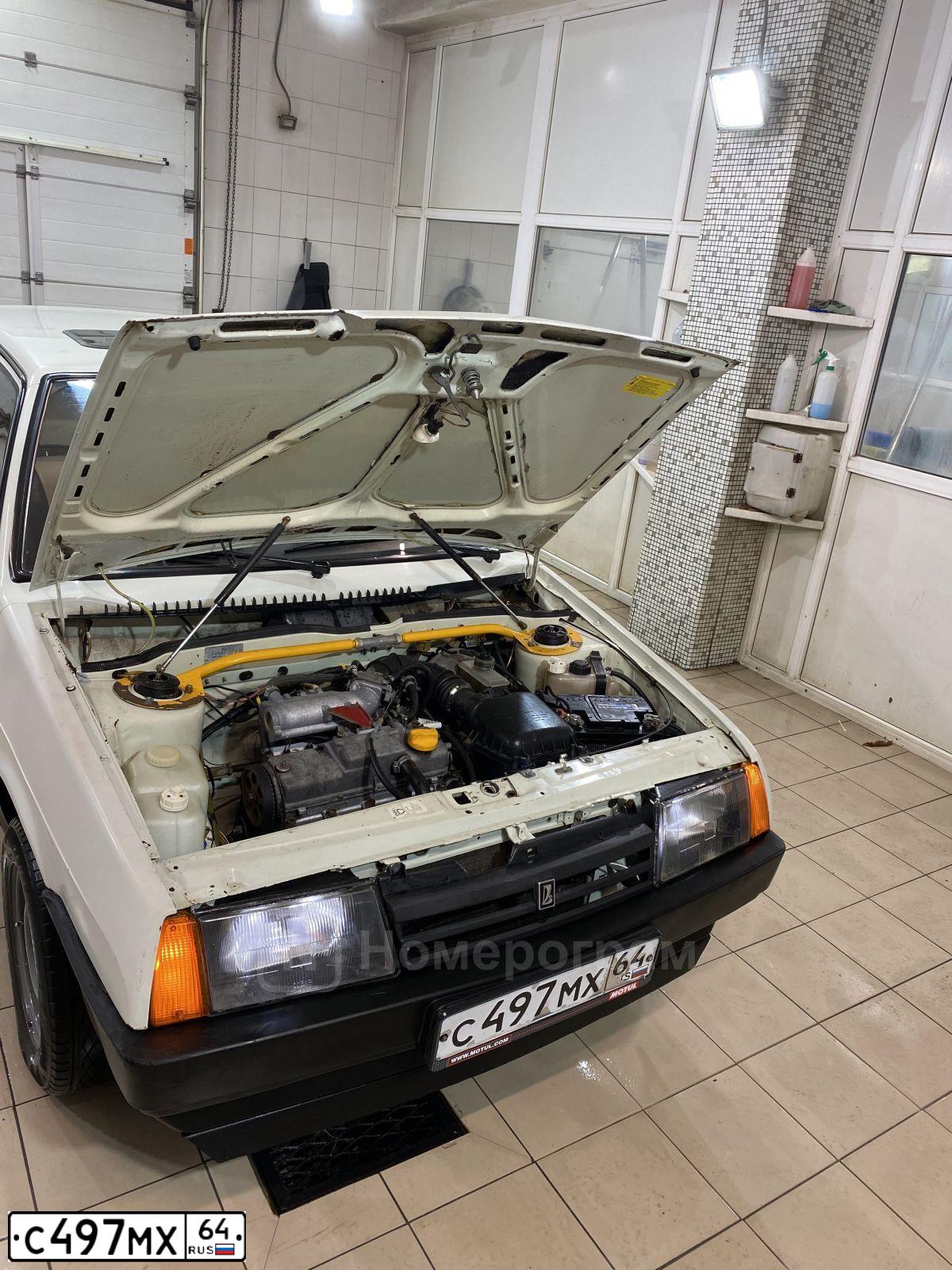Фото автомобиля LADA 2109 SAMARA, 1997 — госномер С497МХ64. Цвет: Белый