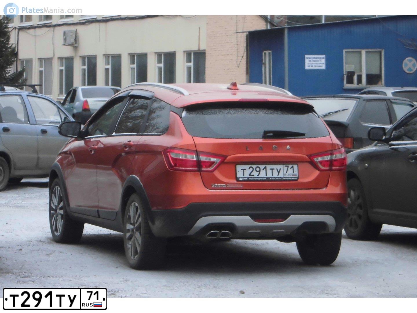 Фото автомобиля LADA VESTA, 2019 — госномер У240ОР71. Цвет: Оранжевый