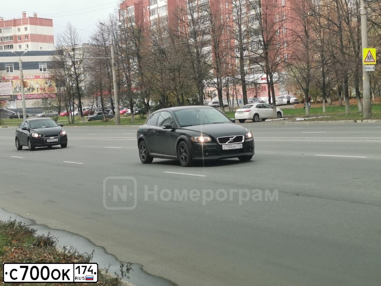 Фото автомобиля MAZDA A 3, 2007 — госномер О602АЕ174. Цвет: сине-зеленый