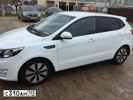 Фото автомобиля KIA SPORTAGE, 2011 — госномер С310АН123. Цвет: Серый