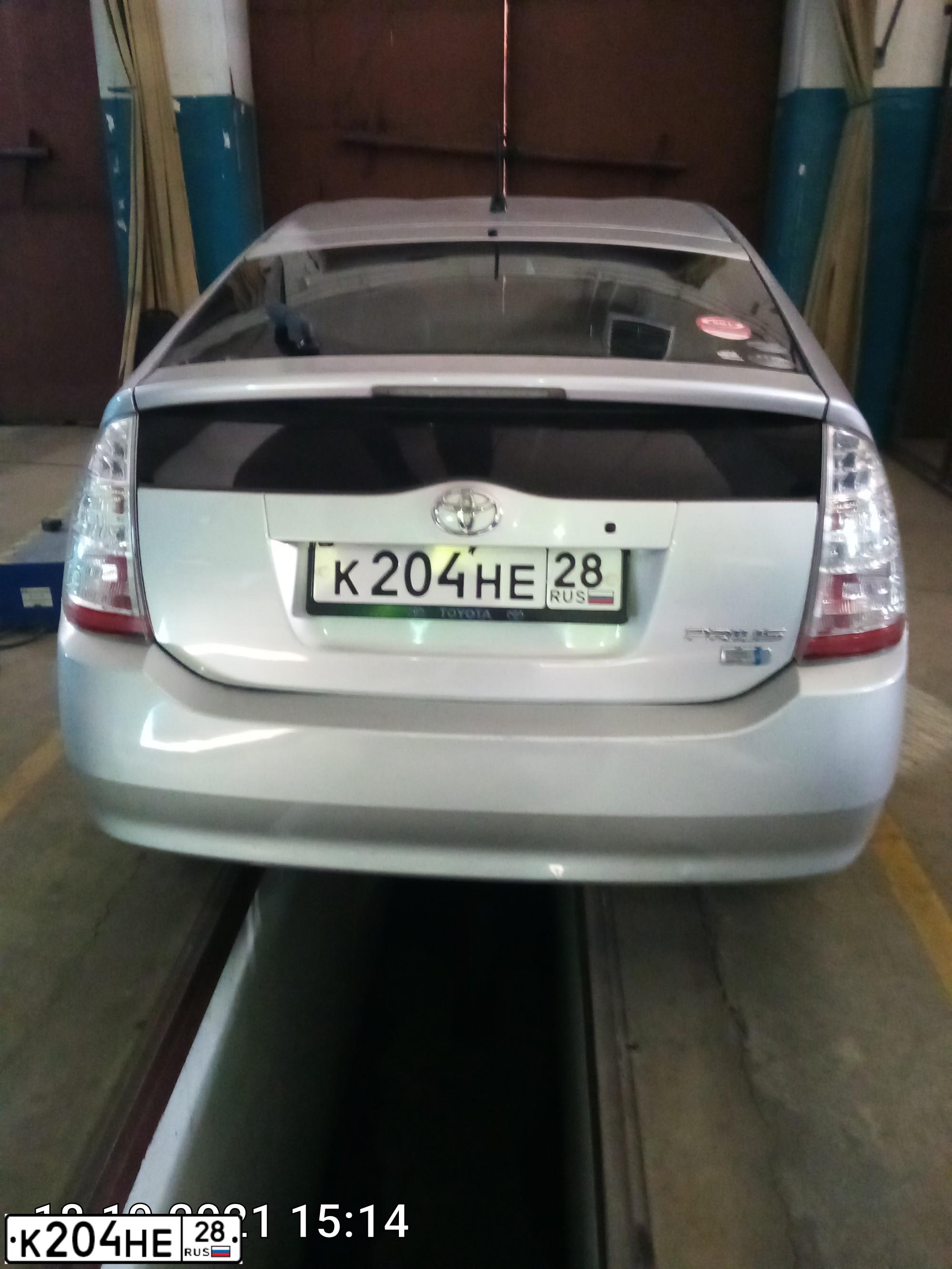Фото автомобиля TOYOTA PRIUS, 2009 — госномер Р770УВ69
