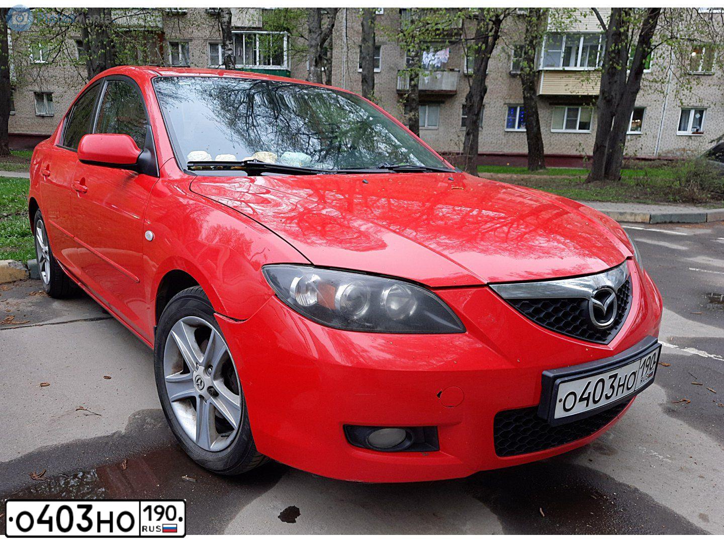 Фото автомобиля MAZDA 3, 2007 — госномер А002АХ199. Цвет: КРАСНЫЙ