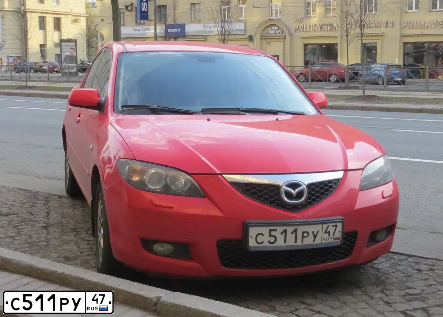 Фото автомобиля MAZDA 3, 2007 — госномер С511РУ47. Цвет: КРАСНЫЙ