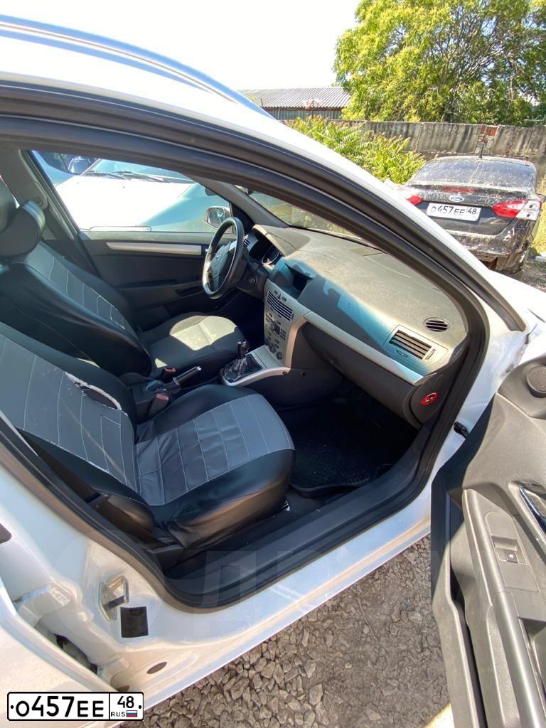 Фото автомобиля FORD FOCUS, 2012 — госномер М974СХ190. Цвет: ЧЕРНЫЙ