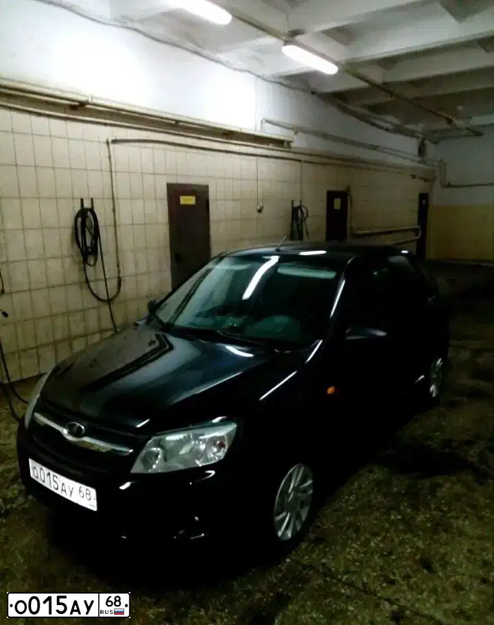 Фото автомобиля LADA 2190 GRANTA, 2015 — госномер О015АУ68. Цвет: ЧЕРНЫЙ