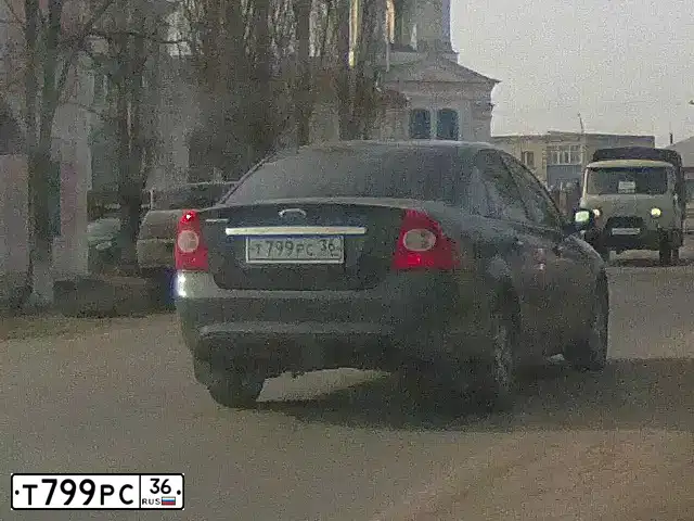 Фото автомобиля FORD FOCUS, 2009 — госномер Т799РС36. Цвет: ТЕМНО-СЕРЫЙ