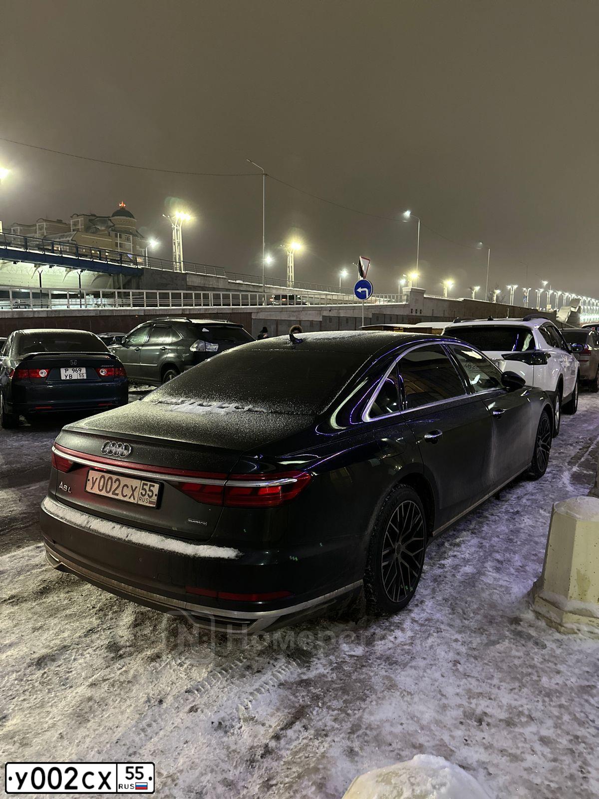 Фото автомобиля AUDI A8, 2019 — госномер У002СХ55. Цвет: черный