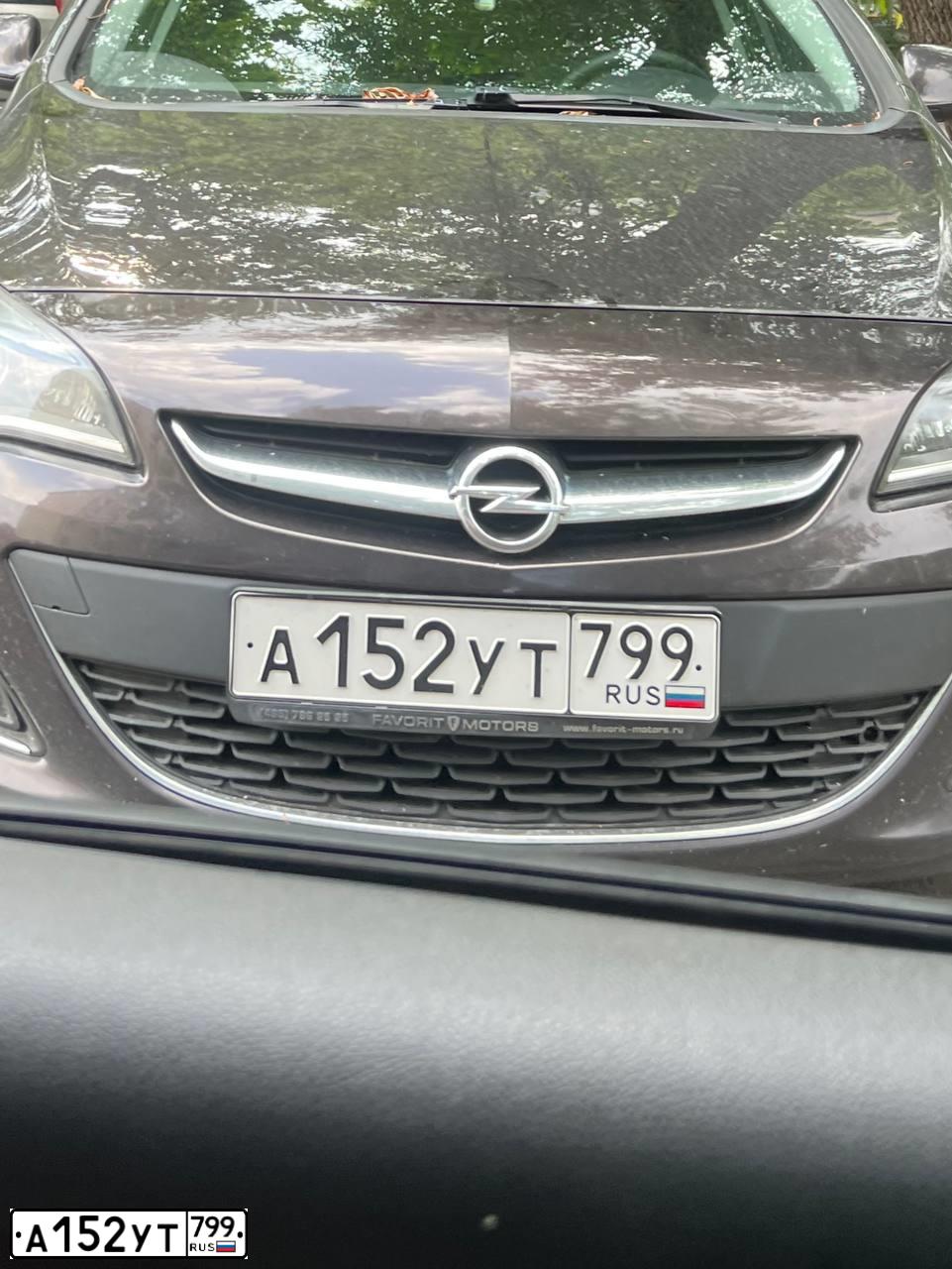 Фото автомобиля OPEL ASTRA, 2013 — госномер А152УТ799. Цвет: КОРИЧНЕВЫЙ МЕТАЛЛИК