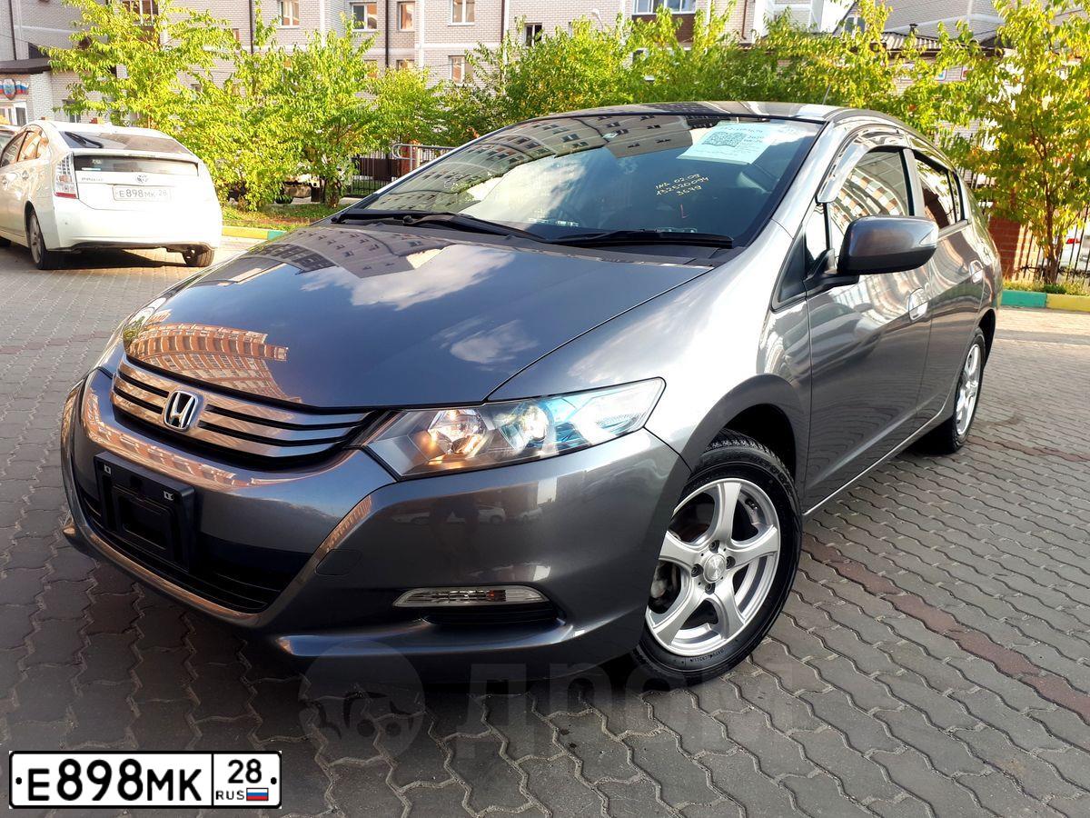 Фото автомобиля TOYOTA PRIUS, 2011 — госномер Е898МК28