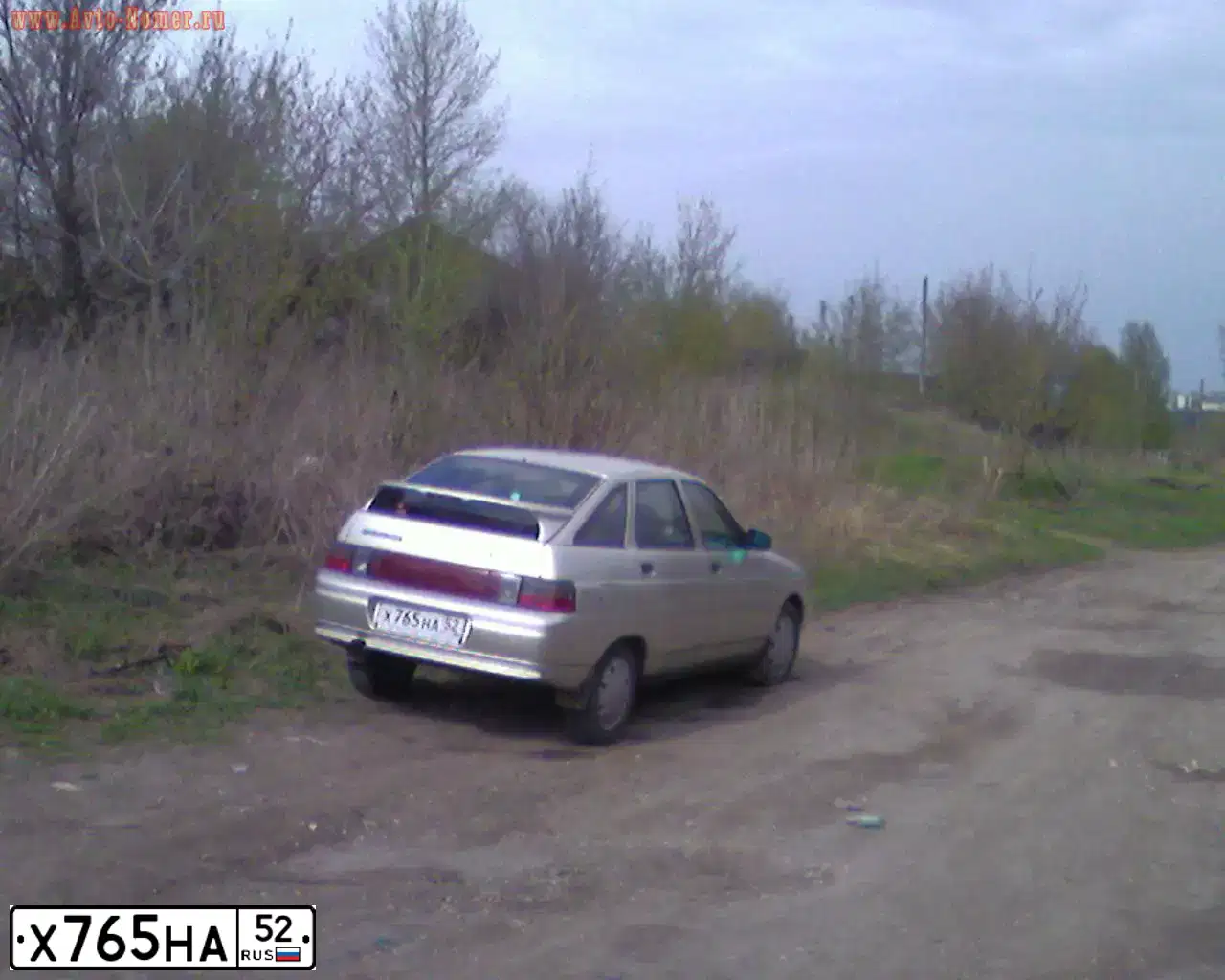 Фото автомобиля LADA 2112, 2006 — госномер Х765НА52. Цвет: СЕРЕБРИСТО-БЕЖЕВЫЙ