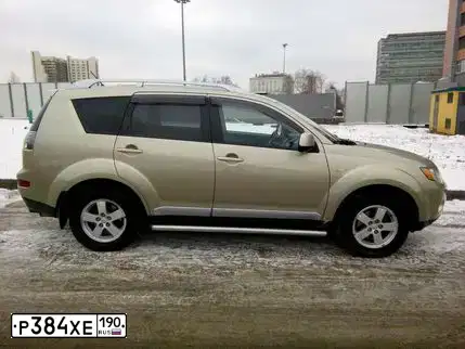 Фото автомобиля MITSUBISHI OUTLANDER, 2007 — госномер Е249ОК21. Цвет: БЕЖЕВЫЙ