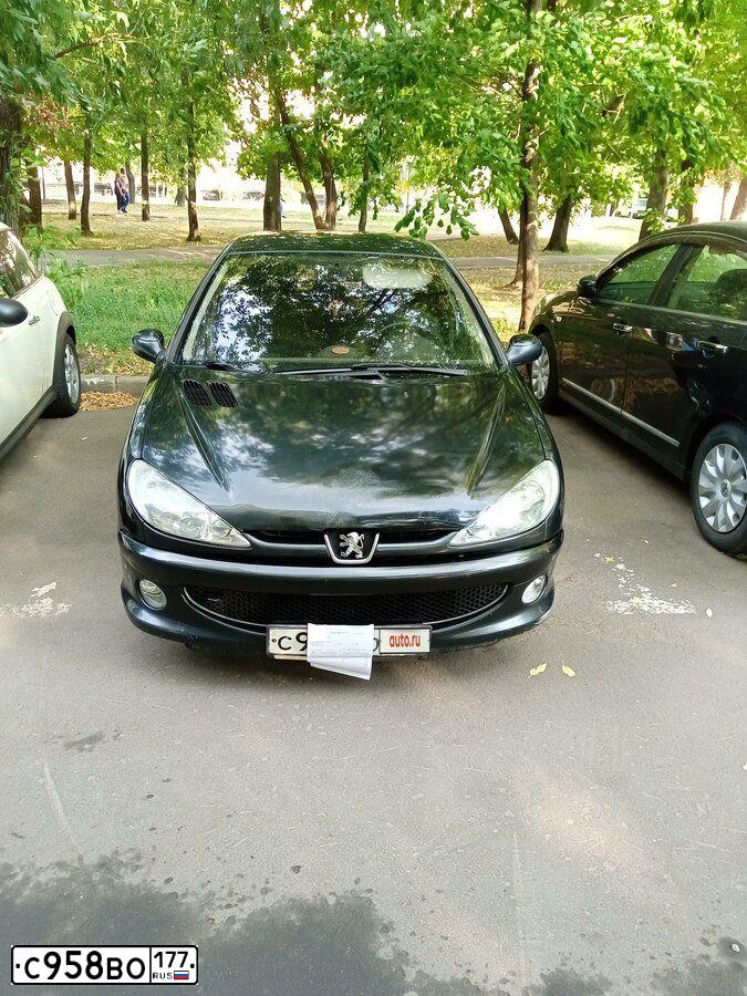 Фото автомобиля ПЕЖО 206, 2005 — госномер Н095НТ198. Цвет: ЧЕРНЫЙ