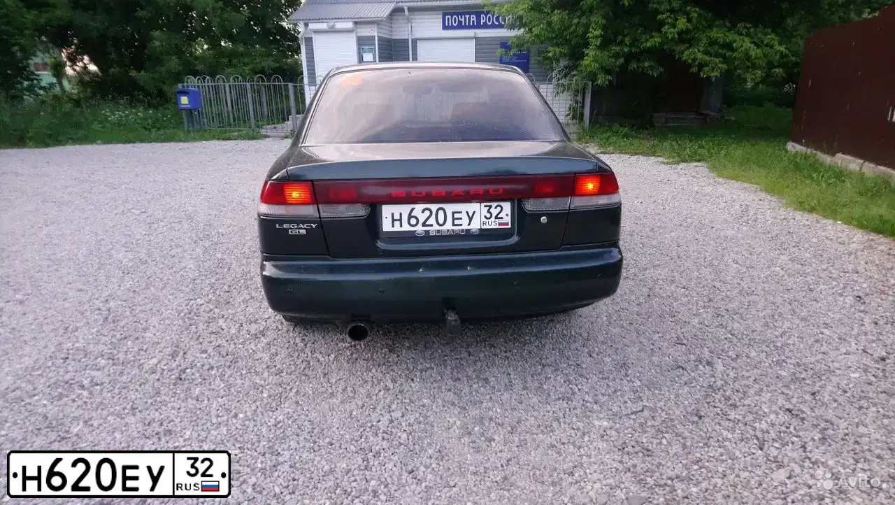 Фото автомобиля SUBARU LEGACY, 1997 — госномер О341АС32. Цвет: ТЕМНО-ЗЕЛЕНЫЙ