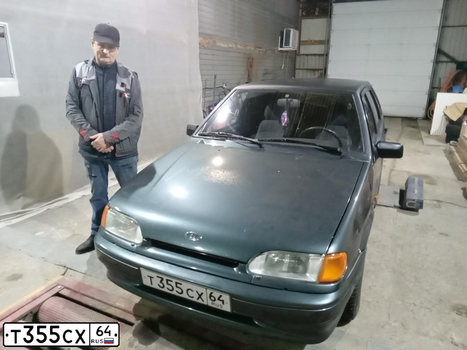 Фото автомобиля LADA 2114 SAMARA, 2010 — госномер Т355СХ64. Цвет: Серо-сине-зеленый