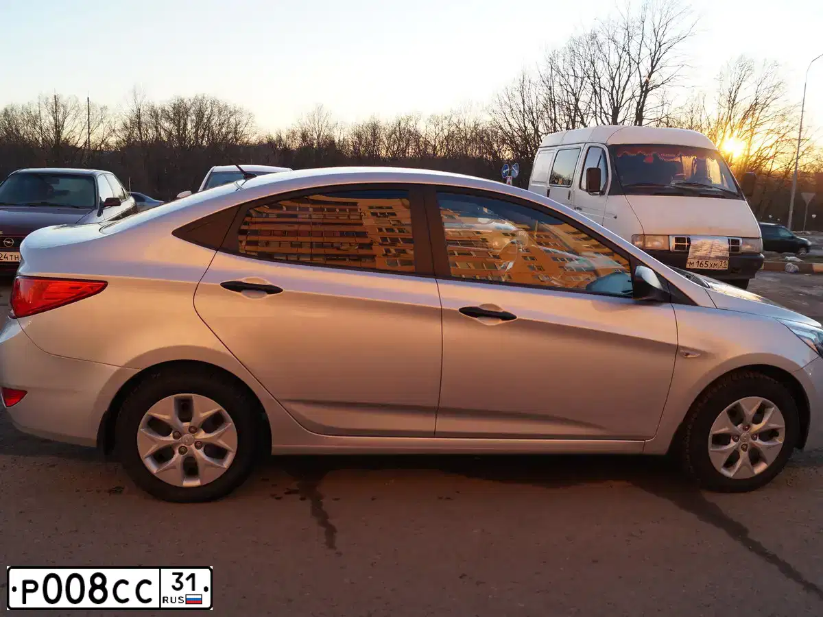 Фото автомобиля LADA 2111, 2005 — госномер Р008СС31. Цвет: МАЛИНОВЫЙ