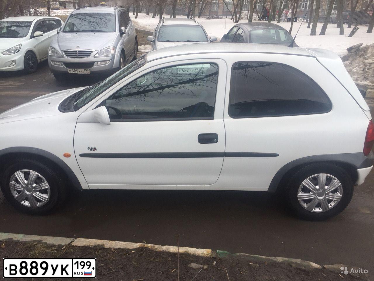 Фото автомобиля SSANGYONG KYRON, 2009 — госномер В889УК199. Цвет: СЕРЫЙ