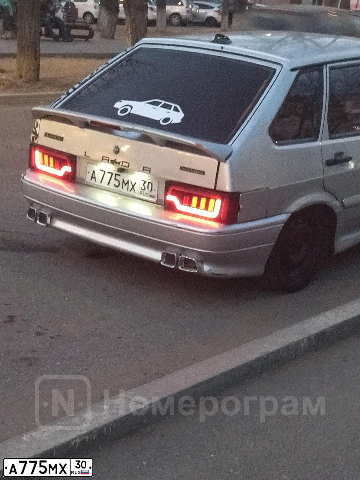 Фото автомобиля LADA 2114 SAMARA, 2007 — госномер А775МХ30. Цвет: СВЕТЛО-СЕРЕБ МЕТАЛ