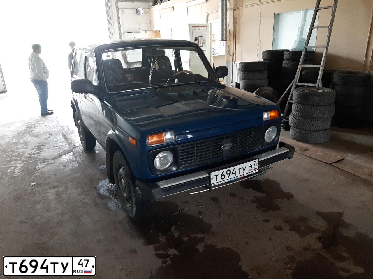 Фото автомобиля LADA 2121 NIVA, 2011 — госномер Т694ТУ47. Цвет: ЗЕЛЕНЫЙ
