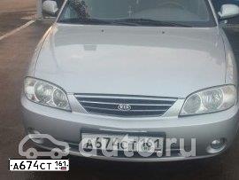 Фото автомобиля KIA SPECTRA, 2006 — госномер Р352НВ30. Цвет: АЛМАЗНОЕ СЕРЕБРО