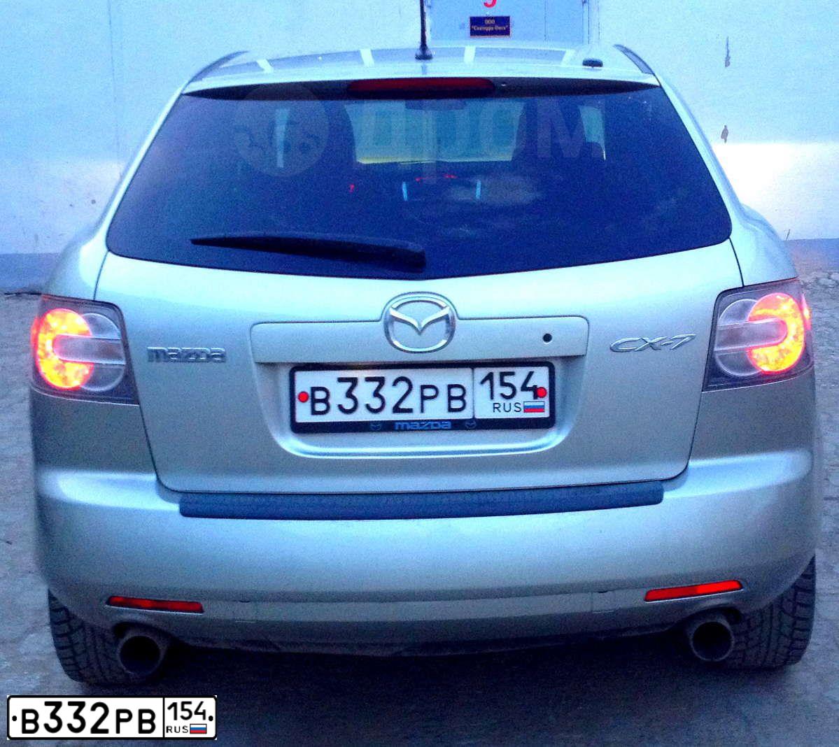 Фото автомобиля MAZDA CX-7, 2006 — госномер Х322УМ174. Цвет: СЕРЫЙ