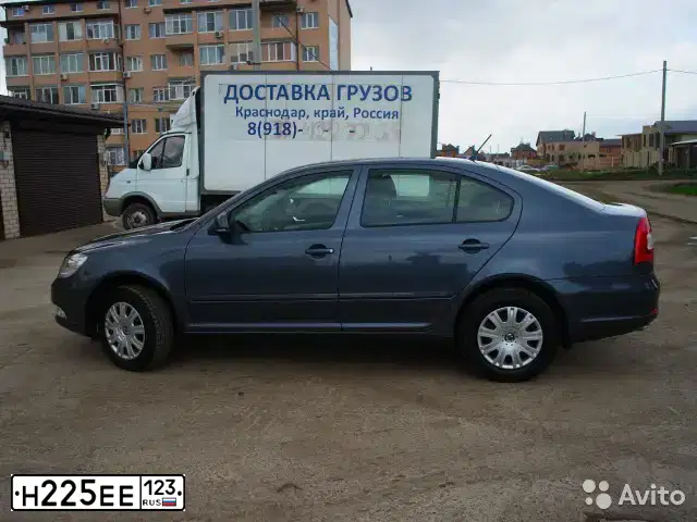 Фото автомобиля SKODA OCTAVIA, 2012 — госномер Н225ЕЕ123. Цвет: ТЕМНО-СЕРЫЙ