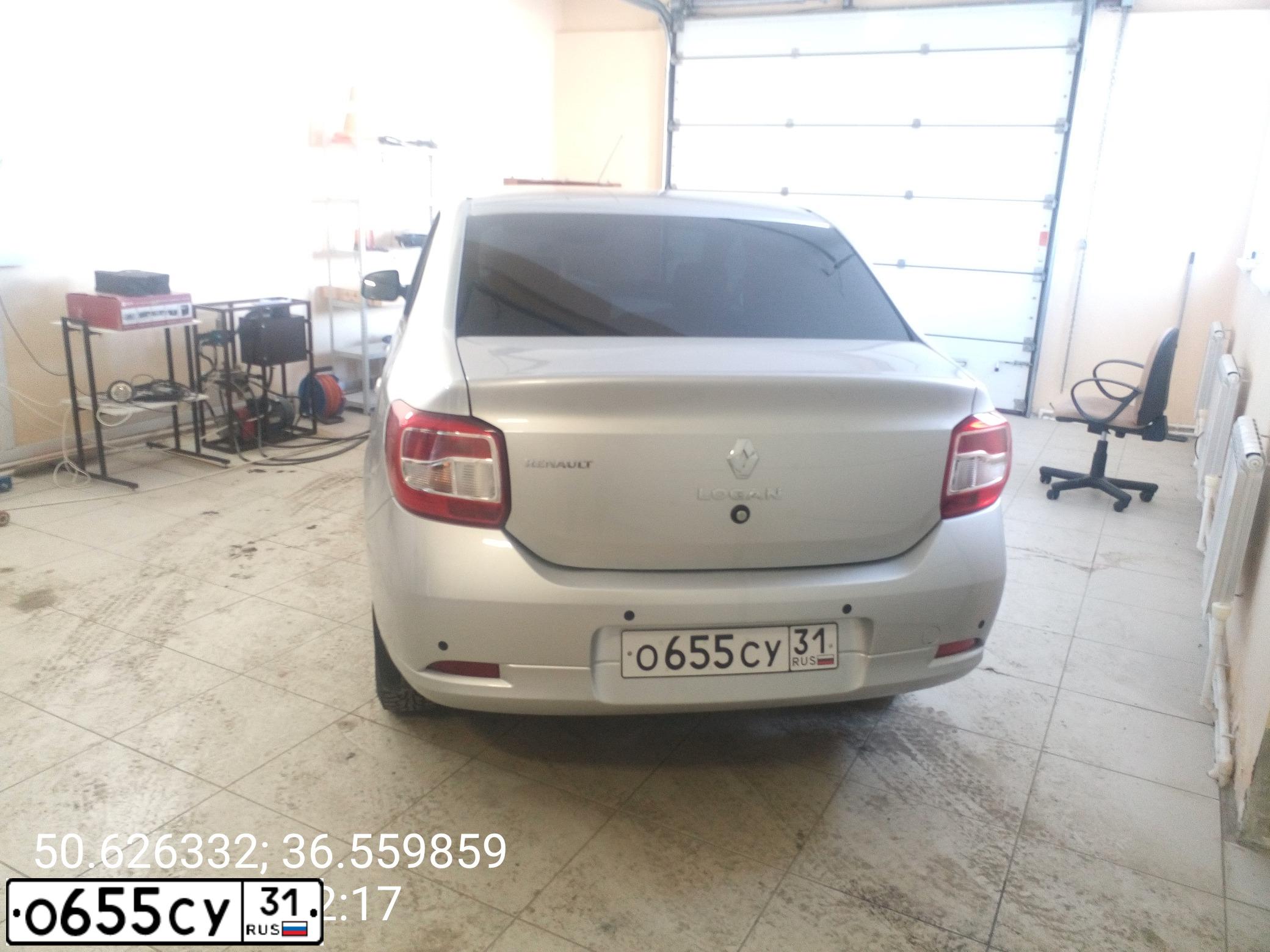 Фото автомобиля RENAULT LOGAN, 2015 — госномер Т652РА31. Цвет: СВЕТЛО-СЕРЫЙ