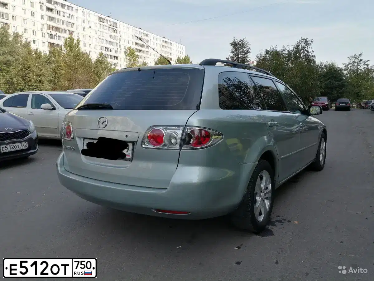 Фото автомобиля KIA CEE'D, 2012 — госномер Е512ОТ750. Цвет: Коричневый