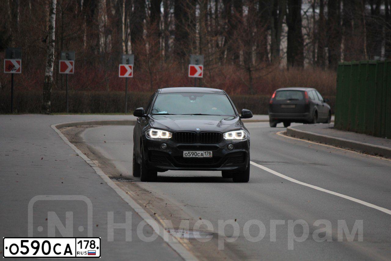Фото автомобиля BMW X6, 2018 — госномер Н013ТМ198. Цвет: ЧЕРНЫЙ