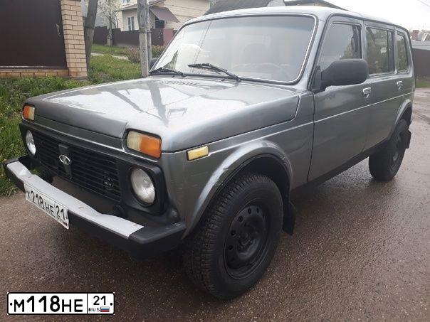 Фото автомобиля LADA 1119 KALINA, 2011 — госномер М118НЕ21. Цвет: Сине-Черный