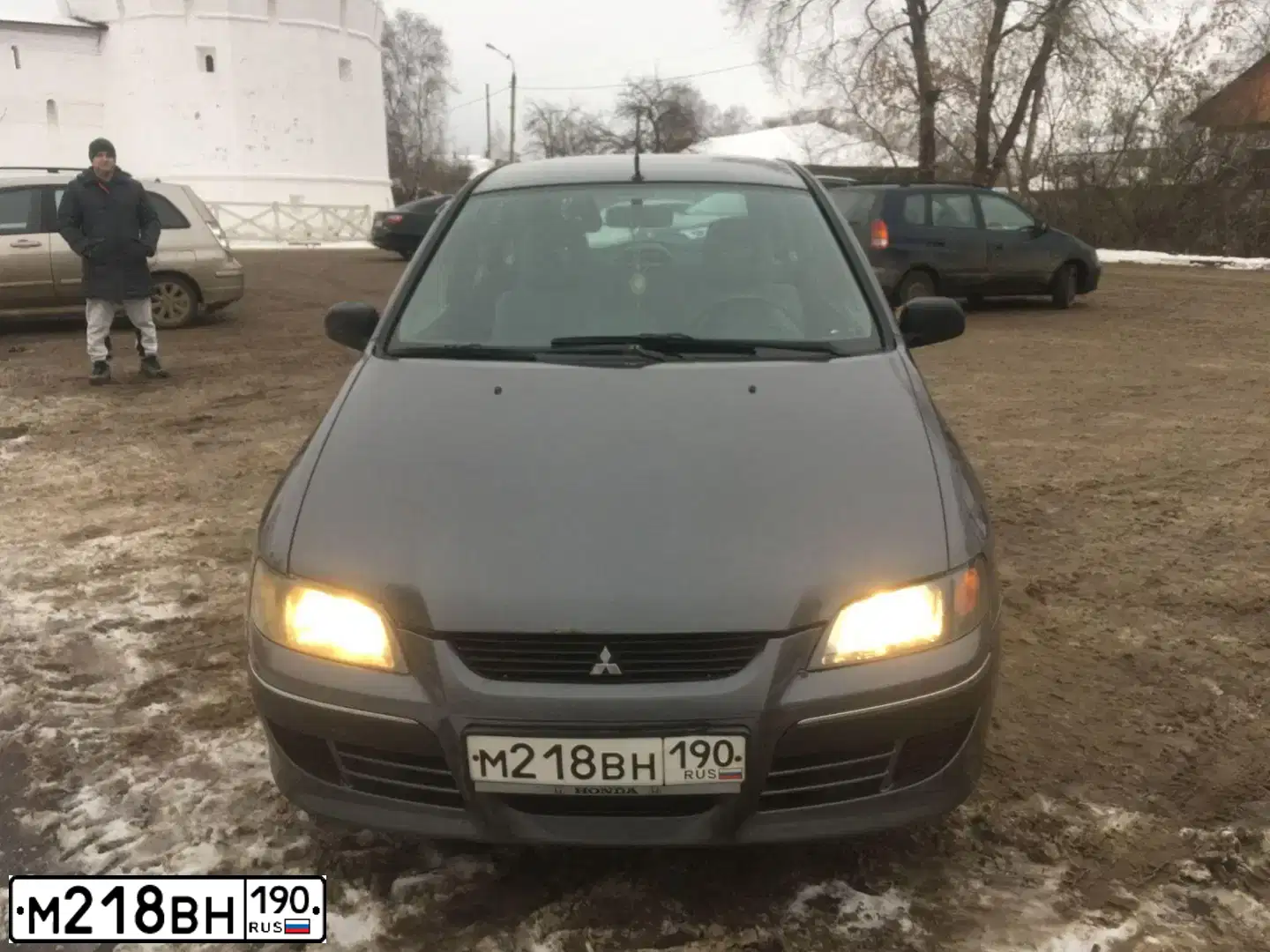Фото автомобиля MITSUBISHI SPACE STAR, 2003 — госномер М218ВН190. Цвет: Серый