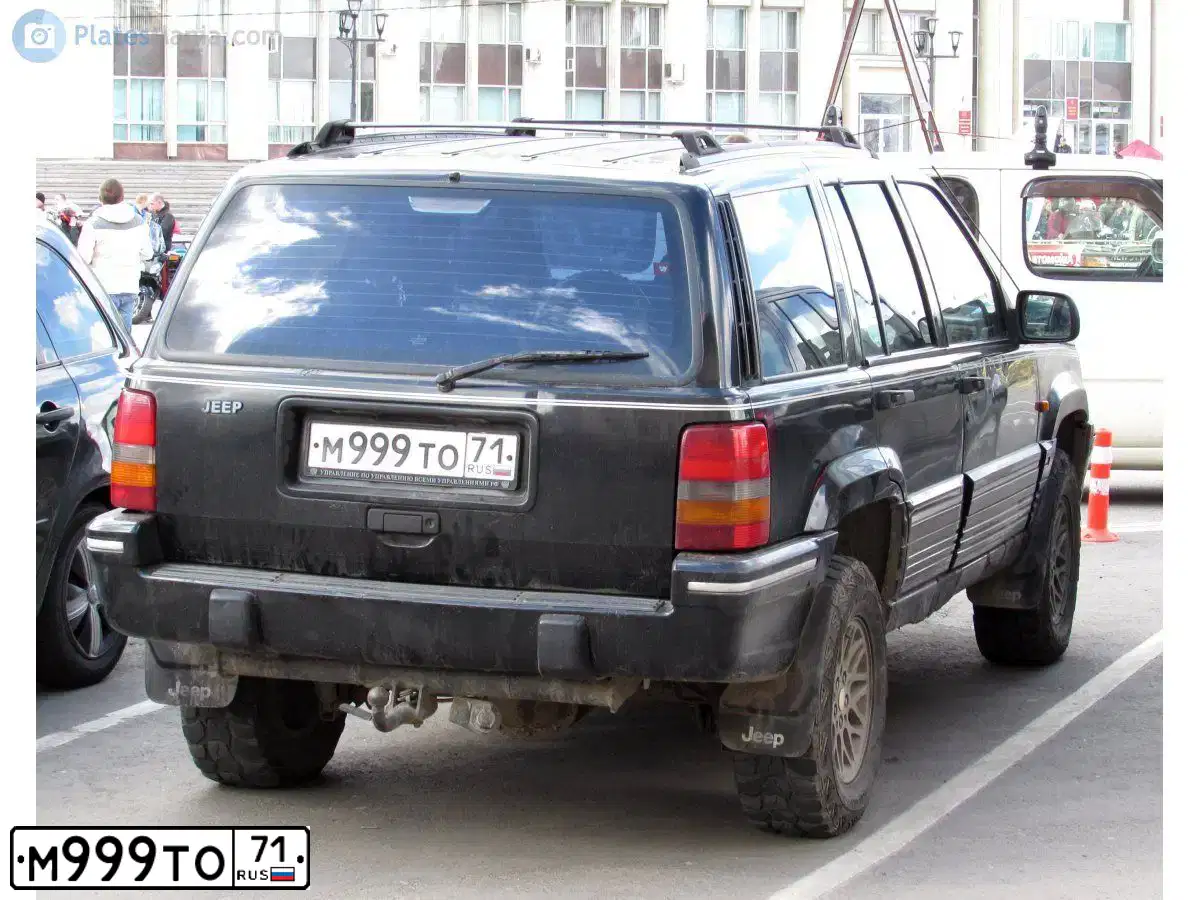 Фото автомобиля JEEP GRAND CHEROKEE, 1994 — госномер М999ТО71. Цвет: ЧЕРНЫЙ