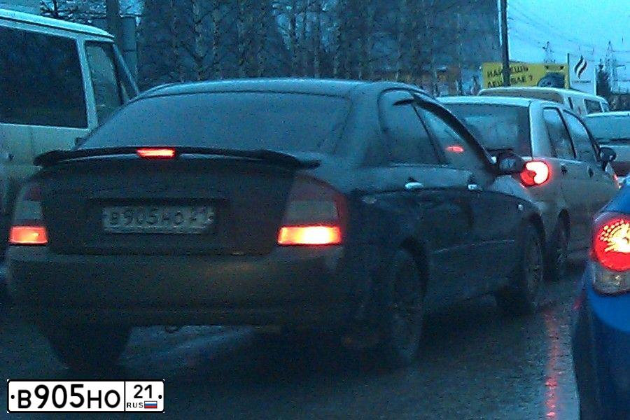 Фото автомобиля KIA CERATO, 2006 — госномер М522РМ21. Цвет: ЧЕРНЫЙ