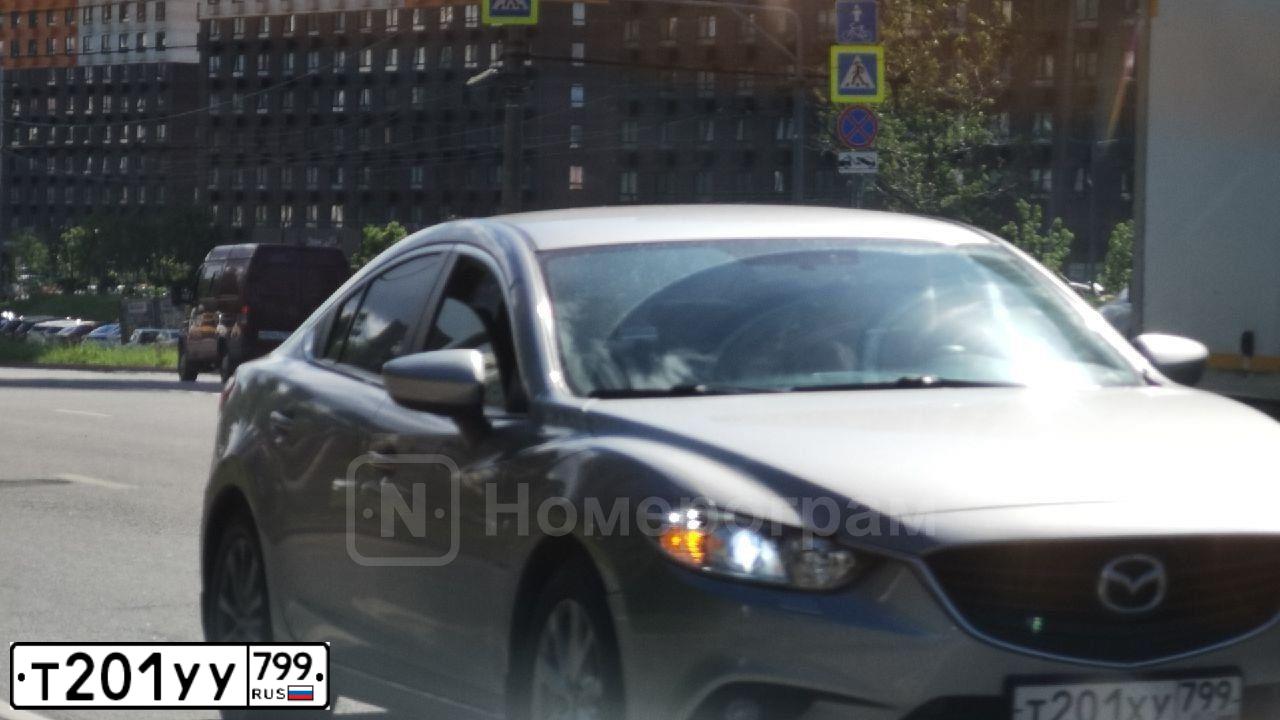 Фото автомобиля NISSAN JUKE, 2012 — госномер Т201УУ799. Цвет: Серый