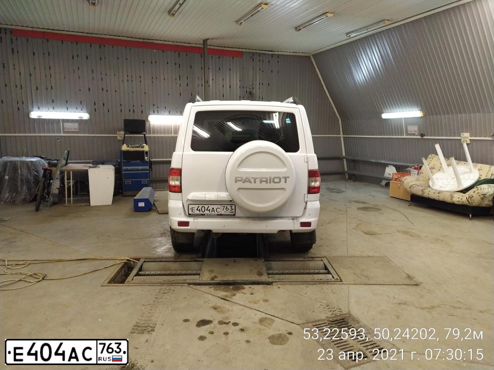 Фото автомобиля UAZ 3163 PATRIOT, 2014 — госномер Р004АЕ58. Цвет: АРКТИКА