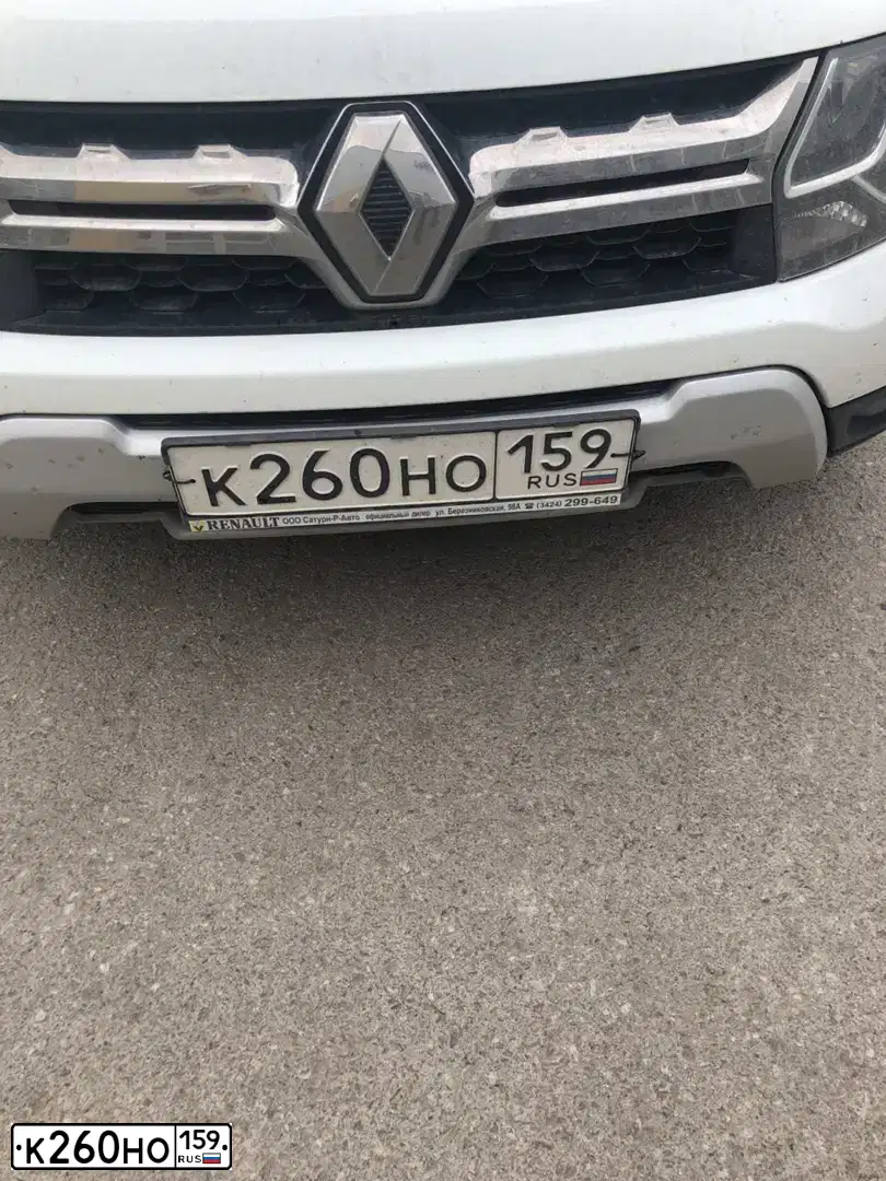 Фото автомобиля RENAULT DUSTER, 2016 — госномер Н389МР154. Цвет: Белый