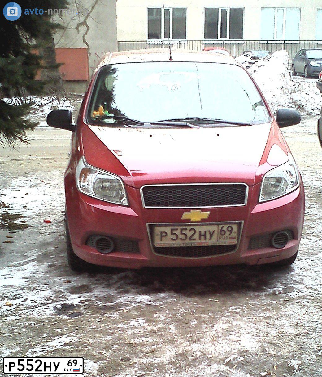 Фото автомобиля CHEVROLET AVEO, 2010 — госномер М423ТМ69. Цвет: Красный