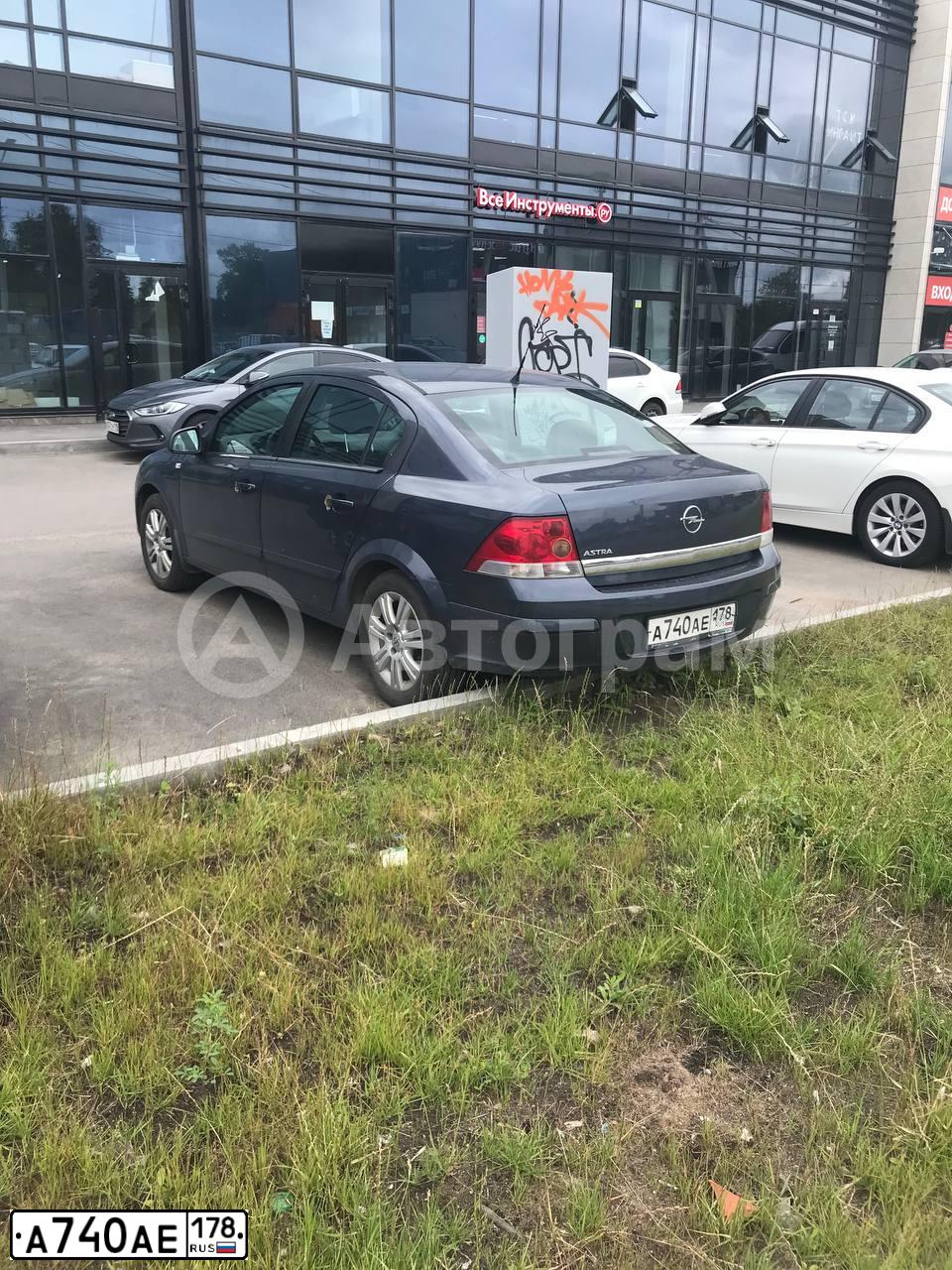 Фото автомобиля OPEL ASTRA, 2010 — госномер А740АЕ178. Цвет: СИНИЙ
