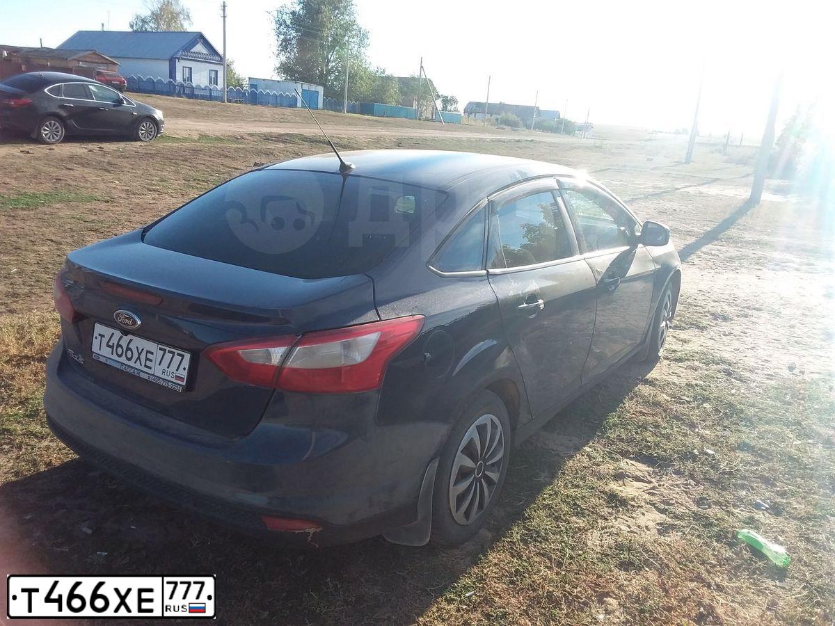 Фото автомобиля FORD FOCUS, 2012 — госномер Т466ХЕ777. Цвет: Темно-синий