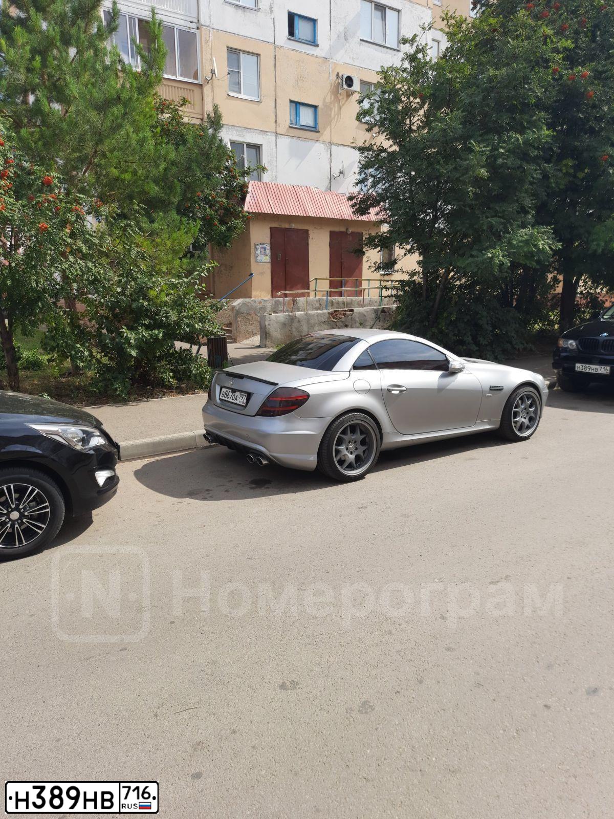 Фото автомобиля BMW X5, 2005 — госномер М044НУ13. Цвет: ЧЕРНЫЙ