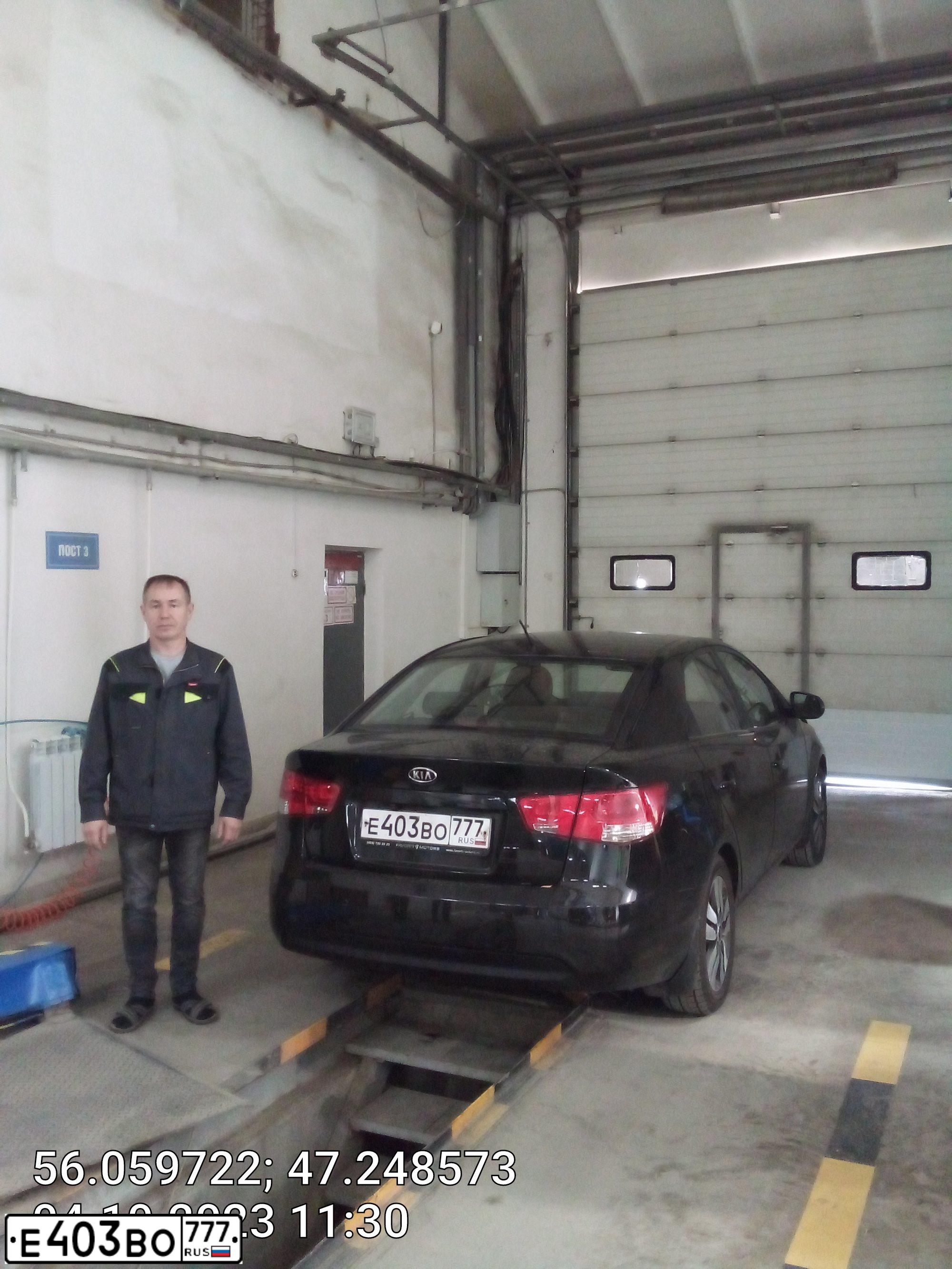 Фото автомобиля KIA CERATO, 2012 — госномер М418КК21. Цвет: ЧЕРНЫЙ