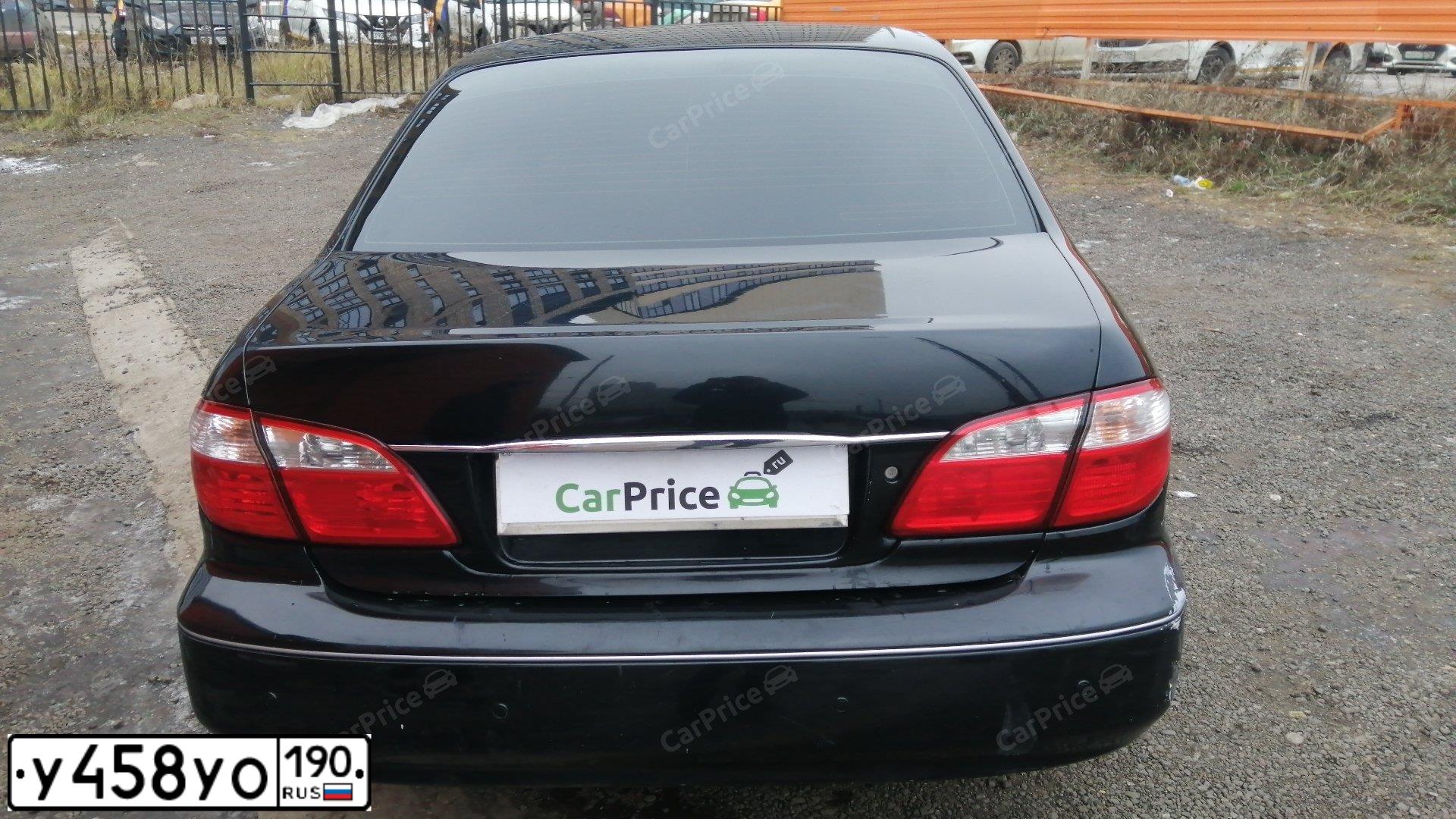 Фото автомобиля NISSAN MAXIMA, 2003 — госномер Х212ХР790. Цвет: ЧЕРНЫЙ